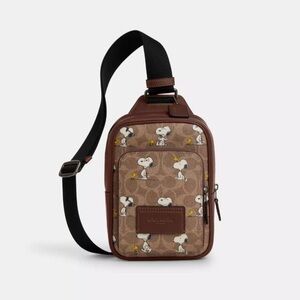 Coach X Peanuts Racer Sling Pack In Signature Canvas With Snoopy Print